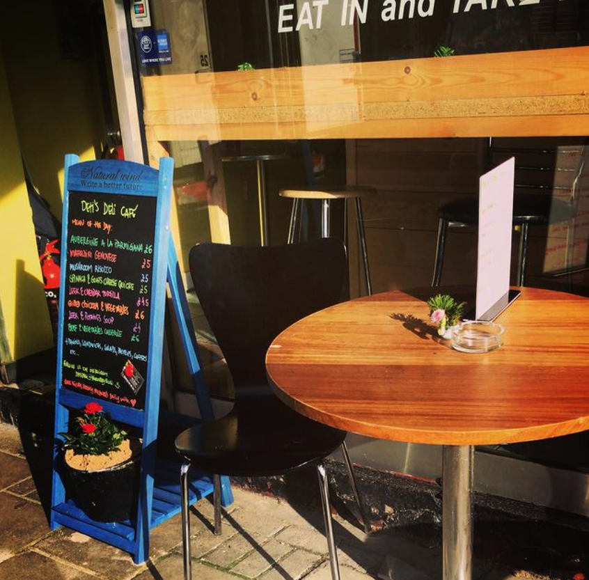 Sunny outside seating in front of Deti's Deli Café.